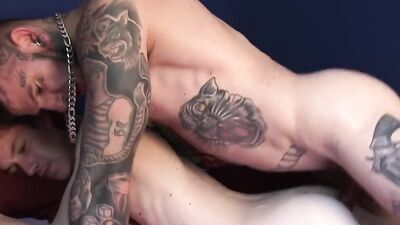 Tattooed man is barebacking his partner and he pushes it balls deep