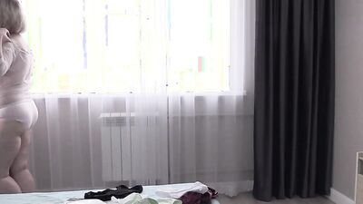 Mature bbw milf tries on panties and shakes her big natural saggy tits.