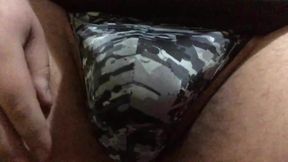 Playing with my bulge in a tight man thong