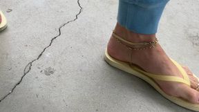 Walking in Light Yellow Old Navy Flip Flops