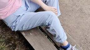 Blue trousers outdoors wetting peeing