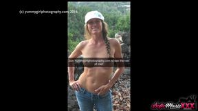 MILF Sofie Marie teases on the beach in her bikini