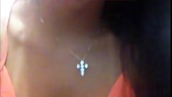 Naughty Paloma Gomes is wearing neon thongs while posing in front of her web camera