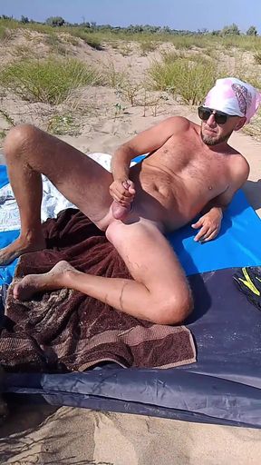 My stepson jerks off to me on a nudist beach