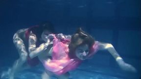 Lilia Mihalkova and Natalia Kupalka underwater lesbians