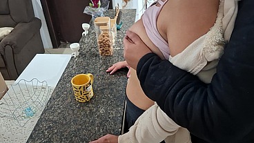 A stepdaughter is surprised while having breakfast.