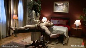 ”Ebony T-girl fucks tied man in mouth”