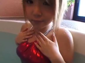 Shiny red metalic swimsuit in the pool