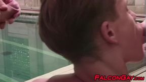Four uncut studs exchange oral sex and anal fucking after swimming hours.