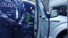 Officer enjoys cigar at end of shift