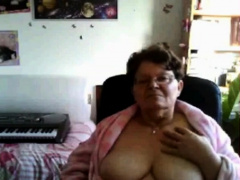 naughty granny flashing her big tits on cam
