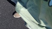 Pissing all over the walking trail out in public around lots of houses while walking with a full bladder