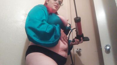 Her massive belly bloated to bursting with bike pump and chugging
