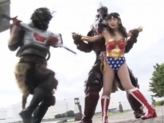 Cute Asian girl in a sexy costume gets used by masked guys