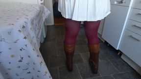 Peeing in red pantyhose on the kitchen table