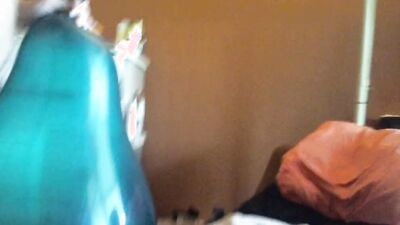Chubby amateur with a mask blows a balloon up and fucks it
