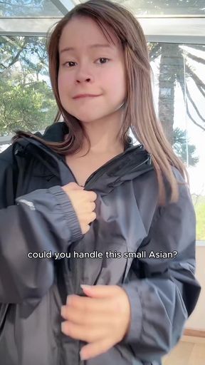 Small but talented girlfriend gives a handjob with an evil grin