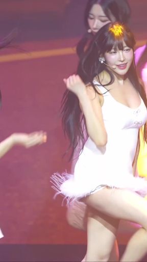 Big-titted K-pop fan shows off her slim body in a standing pose