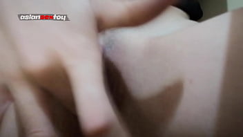 Petite Asian teen self-fingers and shows close-up of wet pussy