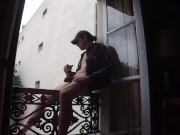 wanking on balcony
