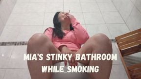 Mia's stinky bathroom while smoking