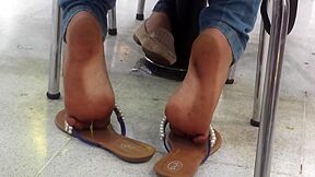 Feet In White Flip Flops