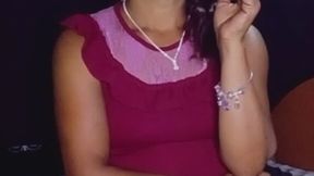 Smoking in a short red dress