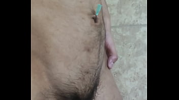 Gay fag playing with his navel and cumming