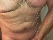 Hot Guy Showering Strokes His Cock Until He Shoots Out a Rope of Cum In Slow Motion & Samples Some