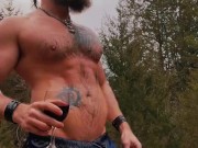 Enjoying a glass of wine covered in oil