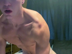 Young stud stretches out his toy while talking dirty