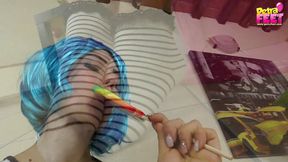 Petra plays with balloons and her feet