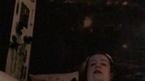Curvy MILF Nymeria Malfoy has intense solo session with wax and feather play