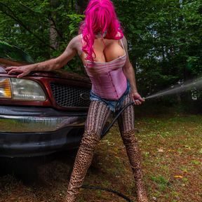 Gigantic fake tits crossdresser  washing my truck in Daisy Dukes high heels and corset