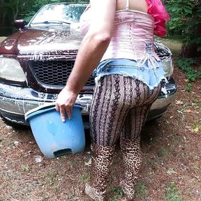 Gigantic fake tits crossdresser  washing my truck in Daisy Dukes high heels and corset