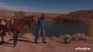 A sexy cowboy and cowgirl have romantic sex outdoors