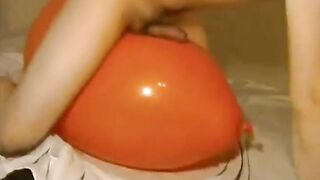 Big inflatable orange balloon humping cum