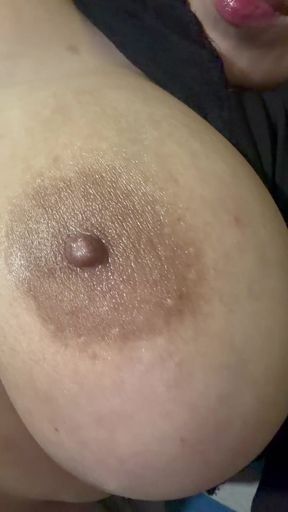 Hot mom massages her huge tits all full of oil