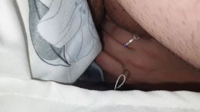 Stepmom discreetly gives stepson a handjob under the covers