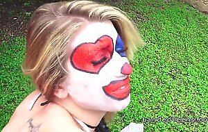 Teen in clown costume banging outdoor to cumshot