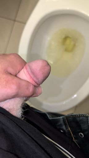 Pissing in a public toilet at the grocery store