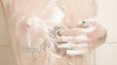 Hot blond Norwegian girl showing off her body in the shower.