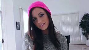 Beautiful brunette babe in pink hat enjoys blowing delicious fat prick