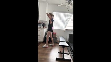 Skinny blonde fits her legs into a wild workout frenzy