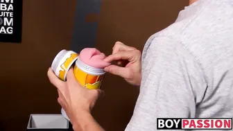 Twink Philip Ashton strokes his big cock with a fleshlight