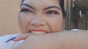 Vampire girl bites her arm uncontrollably