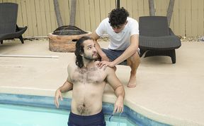 Hairy man and his young stepbrother share the pool side for sex