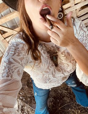 Cigar smoking country girl