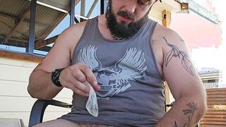 Locked australian bear plays with used love glove