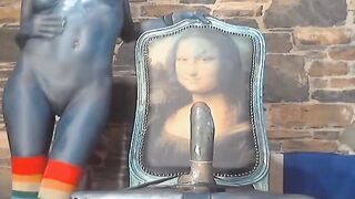 Sexy chick with body ink riding huge dildo